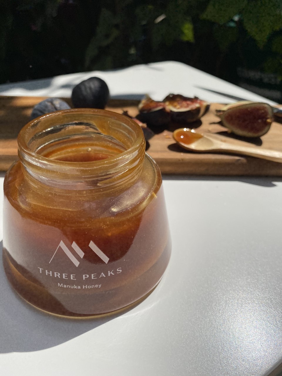 close up of Three Peaks Honey jar